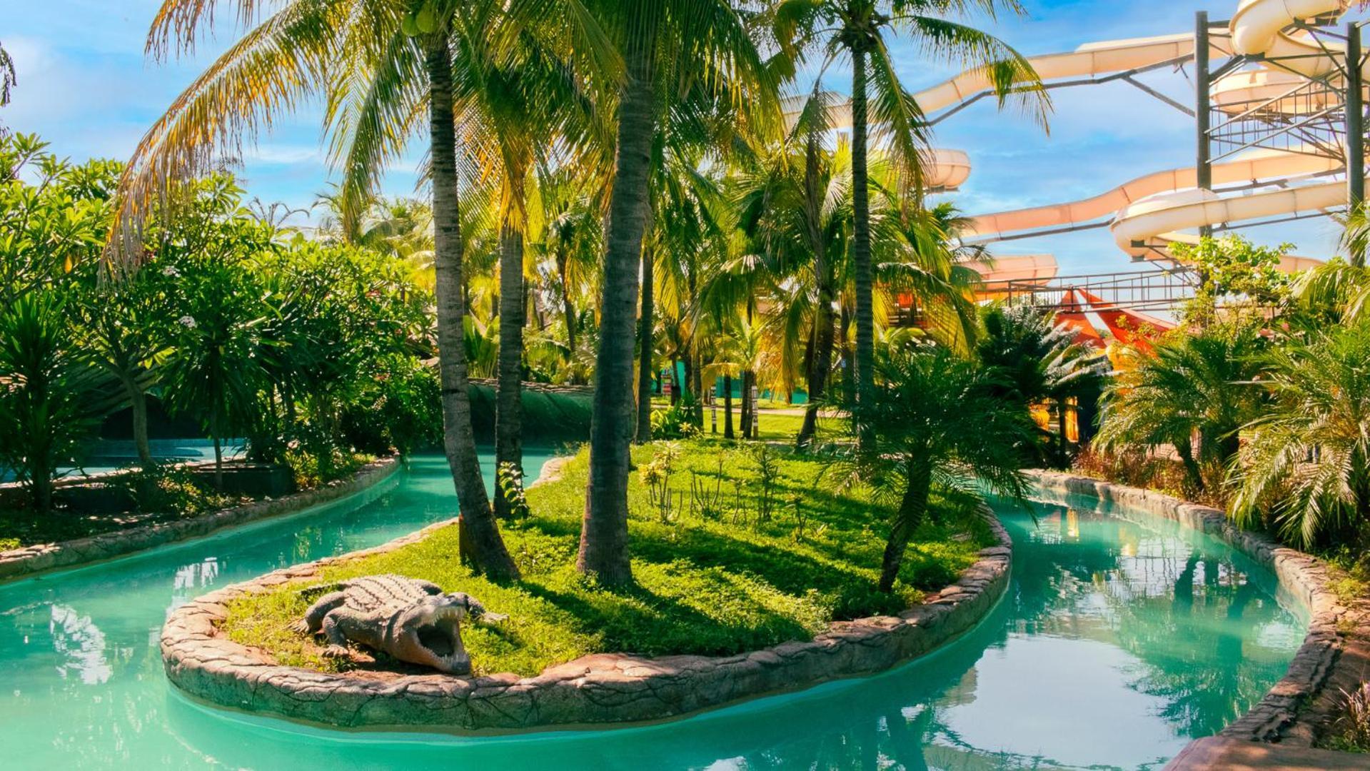 Hot Beach Resort Olimpia Bagian luar foto The artificial river